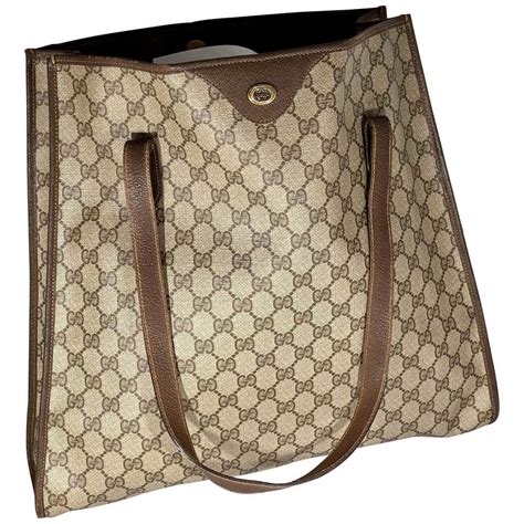 gucci bag monogram brown|Gucci black embossed bag.